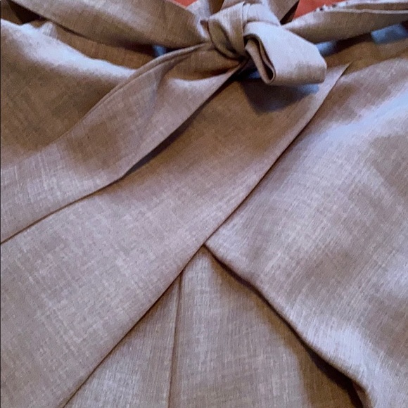 Cross front high waisted slacks with pockets. - Picture 2 of 4